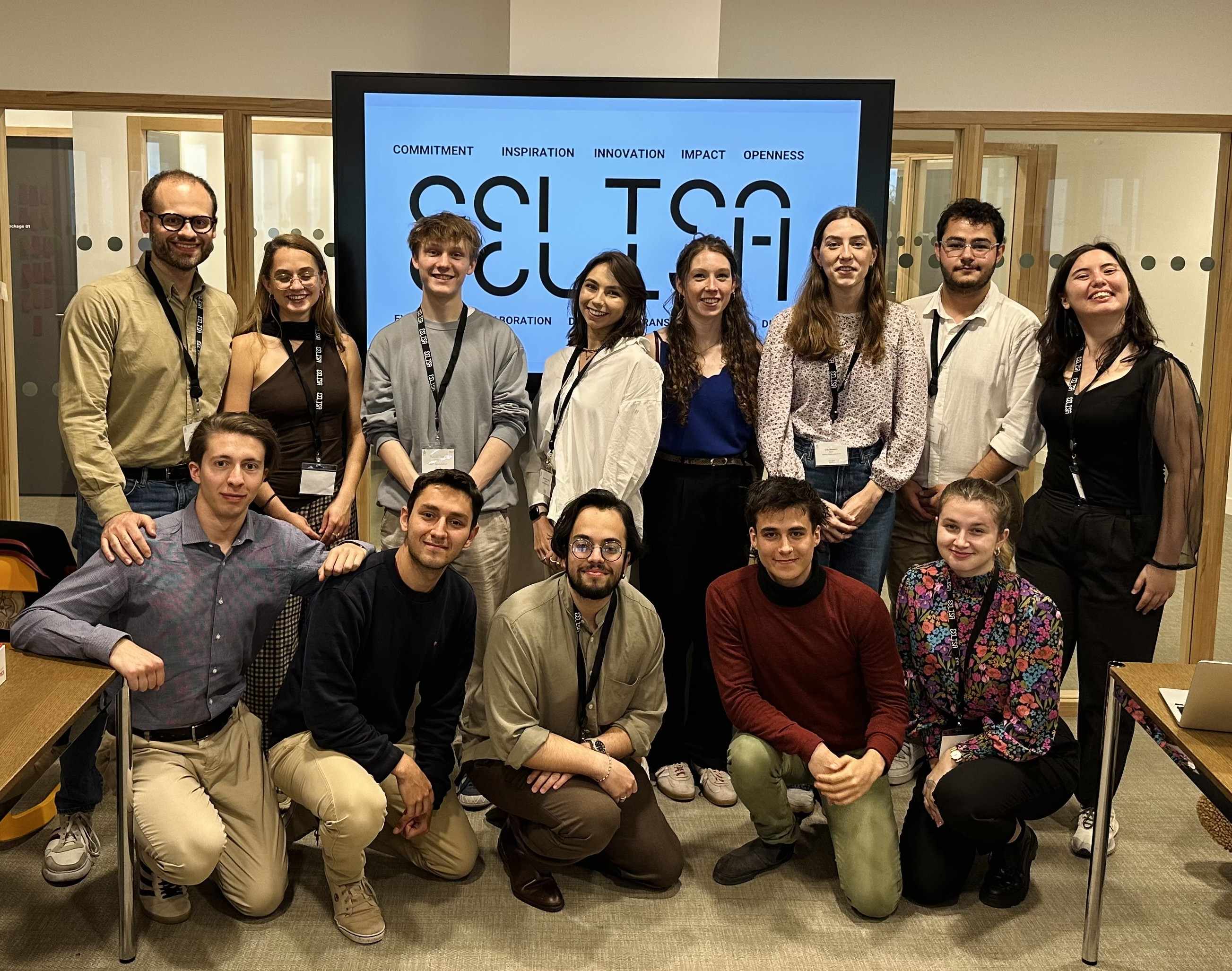 EELISA Student Council members pose in front of a screen that says EELISA