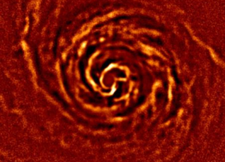 Le disque protoplanétaire d’AB Aurigae