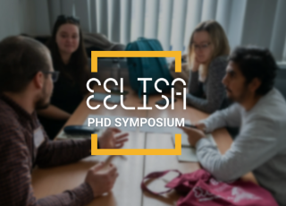 EELISA PhD Symposium sur une photo d'un groupe d'étudiants en train de collaborer sur un projet